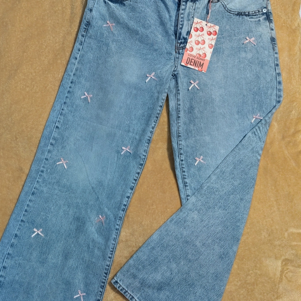 Stylish Blue Flare Jeans with Pink Accents
